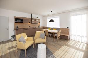 Kuchyňa alebo kuchynka v ubytovaní ALPRIMA Aparthotel Hinterstoder