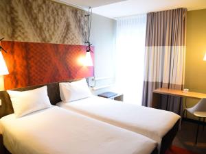 Letto o letti in una camera di ibis Aachen Marschiertor - Aix-la-Chapelle