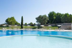 Bazén v ubytování Acaya Golf Resort & Spa nebo v jeho okolí