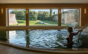 Bazén v ubytování Acaya Golf Resort & Spa nebo v jeho okolí