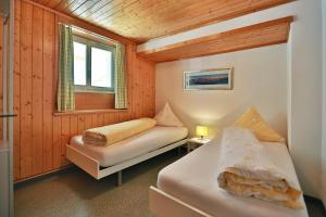 Rúm í herbergi á Ferienwohnung Steinröschen