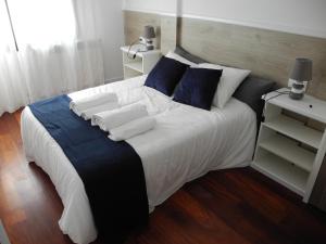Ένα ή περισσότερα κρεβάτια σε δωμάτιο στο VIVIENDA TURÍSTICA LOS OLIVOS
