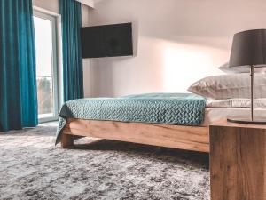 Posteľ alebo postele v izbe v ubytovaní La Park Aparthotel