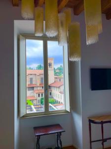 TV a/nebo společenská místnost v ubytování "Camera Con Vista" Bergamo Alta