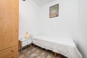Postel nebo postele na pokoji v ubytování Xarus 2