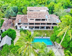an aerial view of a resort with a swimming pool at Serein Beach Hotel in Tangalle