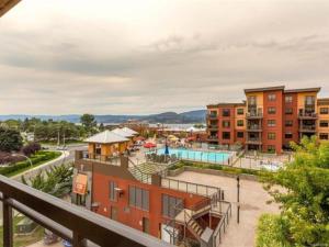 Bright Corner Unit with Lake and Pool Views #543