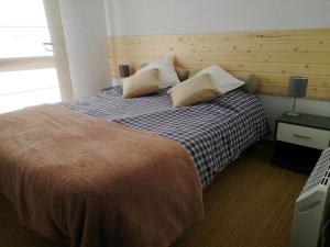 Katil atau katil-katil dalam bilik di Apartamento actualizado en Caldegas