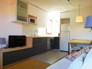 Dapur atau dapur kecil di Apartamento actualizado en Caldegas