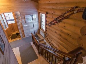 an overhead view of a staircase in a log cabin at Holiday Home Utsu 1 by Interhome in Levi