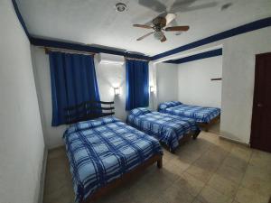 Postel nebo postele na pokoji v ubytování Hotel posada MARCAS