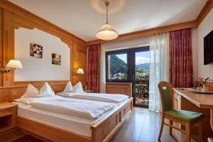Postel nebo postele na pokoji v ubytování Mountain B&B - La Scalira