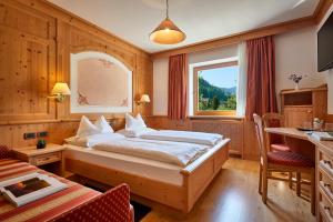 Ένα ή περισσότερα κρεβάτια σε δωμάτιο στο Mountain B&B - La Scalira