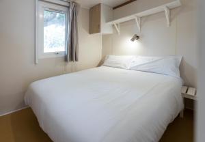 Postel nebo postele na pokoji v ubytování Camping Platja Cambrils
