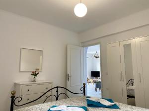 Postel nebo postele na pokoji v ubytování Coralli Pentati 2 "Dimitris Apartments"