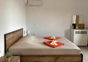 Postel nebo postele na pokoji v ubytování Coralli Pentati 2 "Dimitris Apartments"