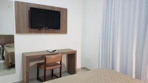TV a/nebo společenská místnost v ubytování Hotel Termas Gravatal