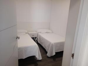 Łóżko lub łóżka w pokoju w obiekcie TEIRABOA BASE CAMP