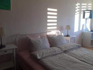 Posteľ alebo postele v izbe v ubytovaní Apartamenty Przy Plaży Gdynia Orłowo