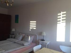 Posteľ alebo postele v izbe v ubytovaní Apartamenty Przy Plaży Gdynia Orłowo
