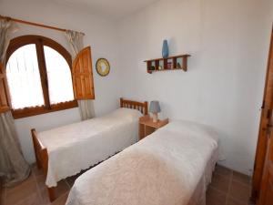 Posteľ alebo postele v izbe v ubytovaní Casa Voramar