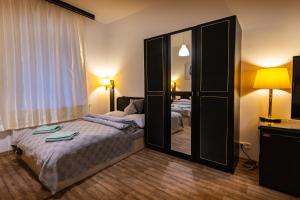 Postel nebo postele na pokoji v ubytování Apartmán U Křížku