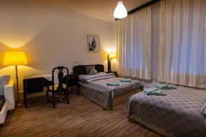 Postel nebo postele na pokoji v ubytování Apartmán U Křížku