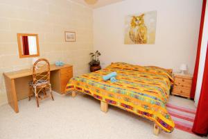 Postel nebo postele na pokoji v ubytování Avalon - Bellevue Gozo