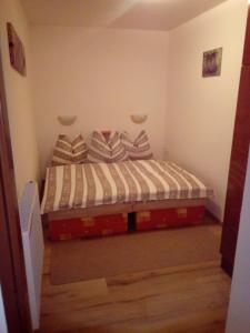 Postel nebo postele na pokoji v ubytování apartmán U parku + 12 fotografií