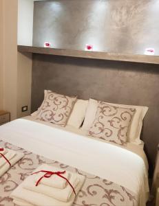 Postel nebo postele na pokoji v ubytování Il Sogno Torino Guesthouse