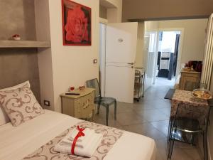 Postel nebo postele na pokoji v ubytování Il Sogno Torino Guesthouse