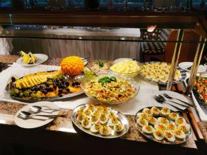 a buffet line with many different types of food at Hotel Gasthaus Bodetal in Rübeland