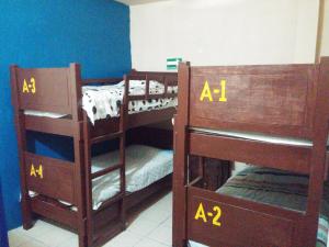 Postel nebo postele na pokoji v ubytování Hotel Quinta San Juan