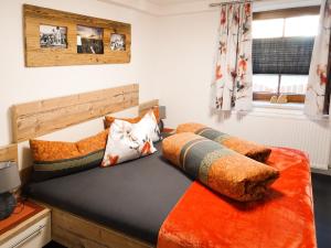 Ein Bett oder Betten in einem Zimmer der Unterkunft Ferienwohnung Lederle