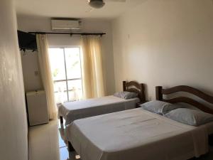 Postel nebo postele na pokoji v ubytování Hotel Lazer Piata