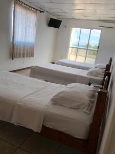 Postel nebo postele na pokoji v ubytování Hotel Lazer Piata