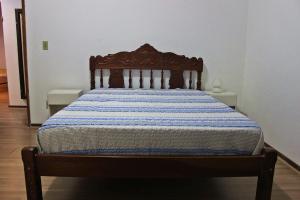 Cama ou camas em um quarto em Apartamento Familiar - Praia da Enseada