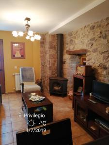 Posezení v ubytování APARTAMENTOS RURALES EL PRIVILEGIO