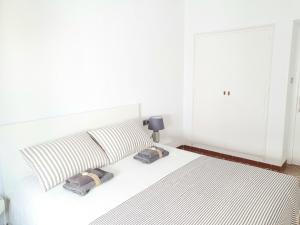 Posteľ alebo postele v izbe v ubytovaní CASA MILA SV guesthouse