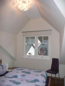 Cama ou camas em um quarto em Mosel Ferienhaus Bernkastel