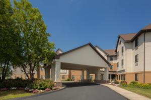 a rendering of a building with a driveway at Holiday Inn Express & Suites Bradley Airport, an IHG Hotel in Windsor Locks