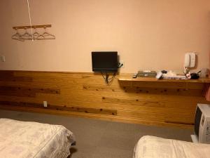 Postel nebo postele na pokoji v ubytování Turtle Inn Nikko