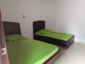 Postel nebo postele na pokoji v ubytování Hotel Mar y Luna