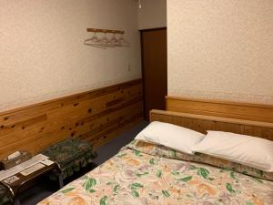 Postel nebo postele na pokoji v ubytování Turtle Inn Nikko