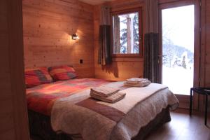 Säng eller sängar i ett rum på Chalet 1155 - Montroc - Chamonix