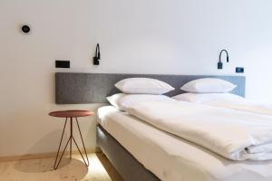 Postel nebo postele na pokoji v ubytování Mari Pop Hotel