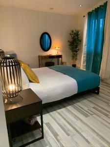מיטה או מיטות בחדר ב-La Bohème - Bed & Breakfast