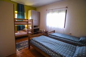 Postelja oz. postelje v sobi nastanitve Yeti (snowman) Guest House