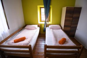 Postelja oz. postelje v sobi nastanitve Yeti (snowman) Guest House