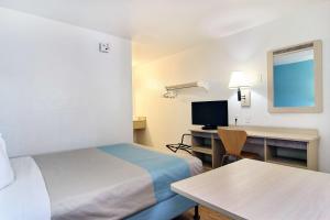 Postel nebo postele na pokoji v ubytování Motel 6-Lubbock, TX